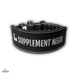 A black weightlifting belt with the brand name 'Supplement Needs' written in white. The belt features a metal buckle and is displayed in an arch shape.